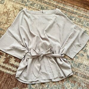 Classic, flattering tie front blouse